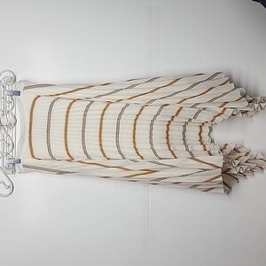 Asymmetrical hem longer on sides pleated lined cream vintage retro skirt.  Sz 6.